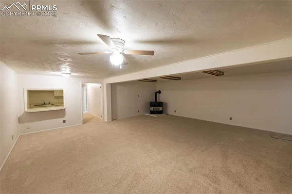 a view of a livingroom with table and chair