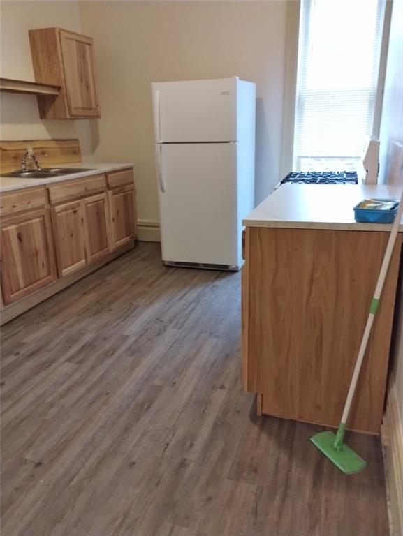 41 Morgantown Street, Unit 7 Uniontown, PA 15401 - Photo 5 of 10 a kitchen with a refrigerator and a stove