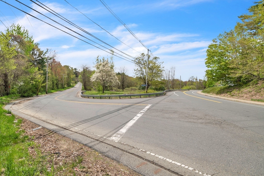 101 Ware Street Palmer, MA 01069 - Photo 13 of 26 a view of a road from a yard