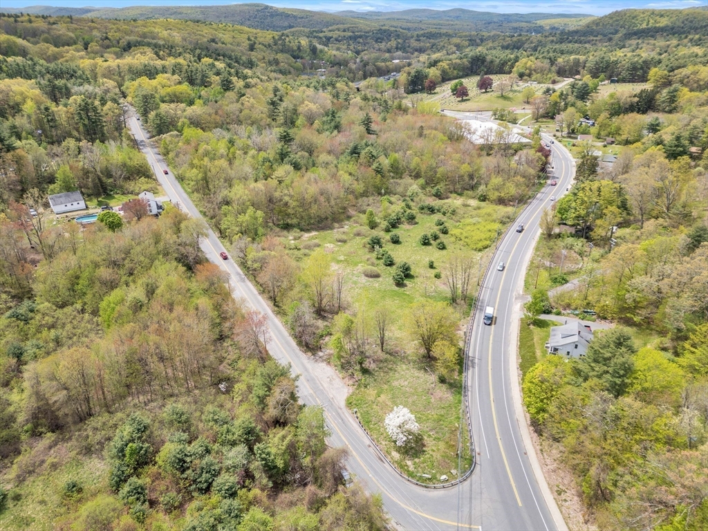 101 Ware Street Palmer, MA 01069 - Photo 3 of 26 an aerial view of residential houses with outdoor space