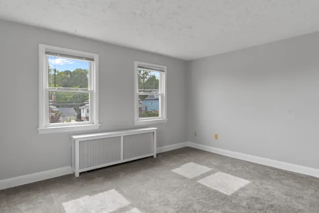 a view of an empty room with window