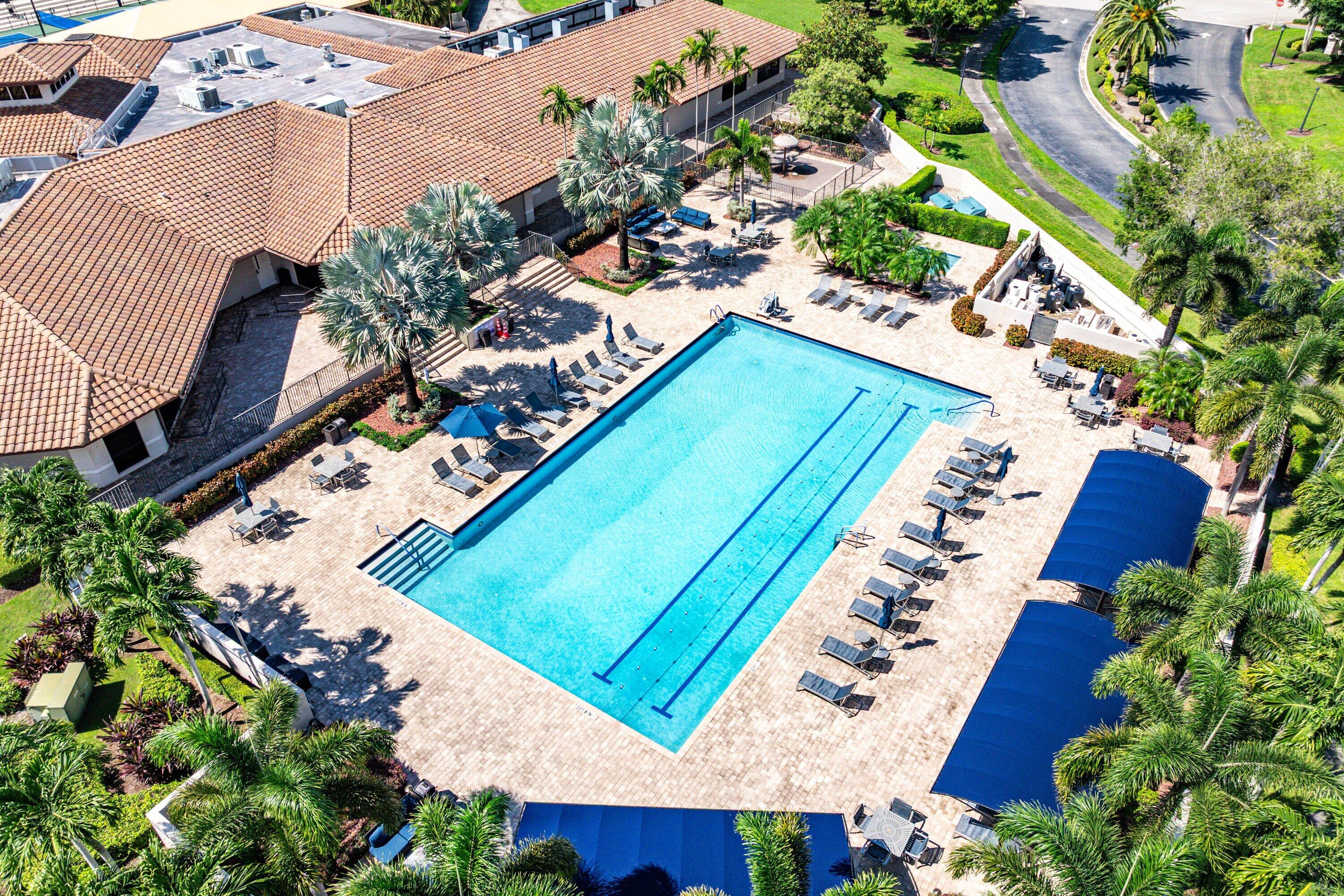 7572 Regency Lake Drive, Unit 301 Boca Raton, FL 33433 - Photo 37 of 38 an aerial view of a house