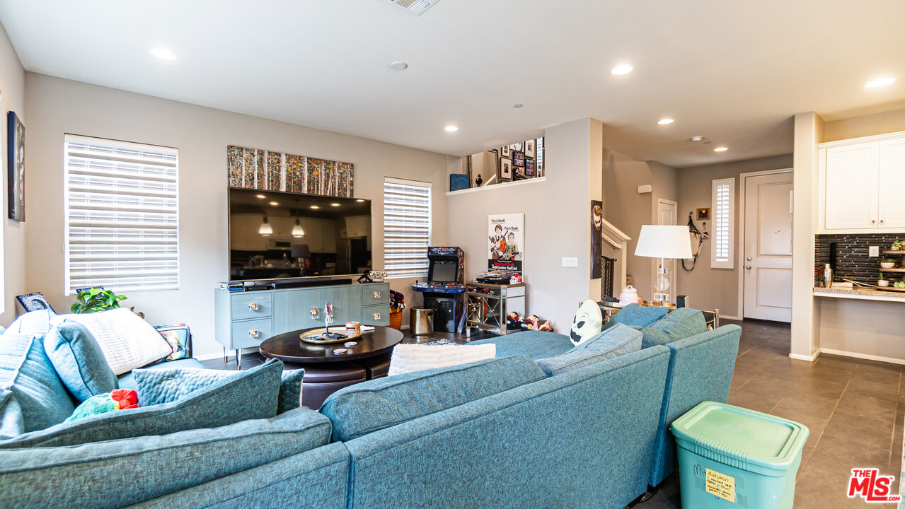 3564 Albion Drive Oxnard, CA 93036 - Photo 15 of 41 a living room with furniture and a flat screen tv