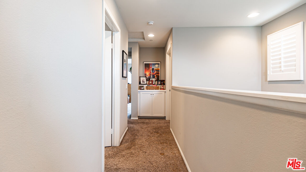 3564 Albion Drive Oxnard, CA 93036 - Photo 19 of 41 a view of a hallway with wooden floor and entryway