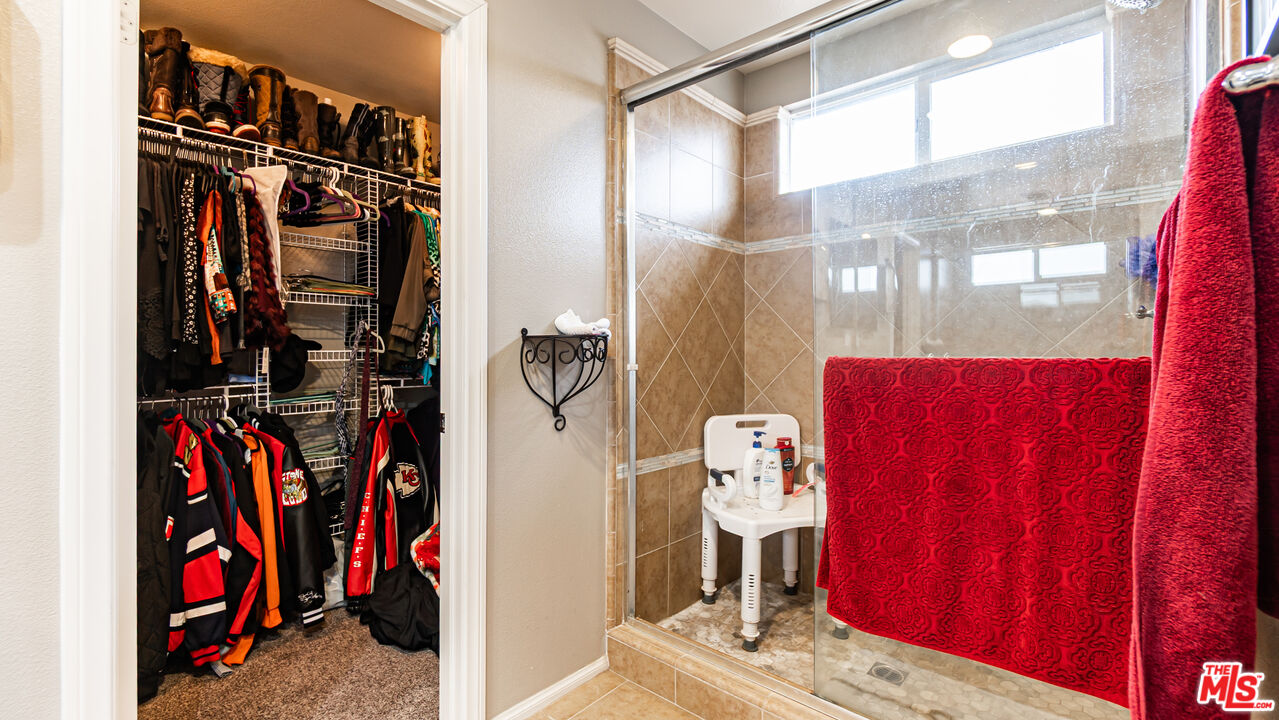 3564 Albion Drive Oxnard, CA 93036 - Photo 28 of 41 a view of walk in closet with clothes and shoes