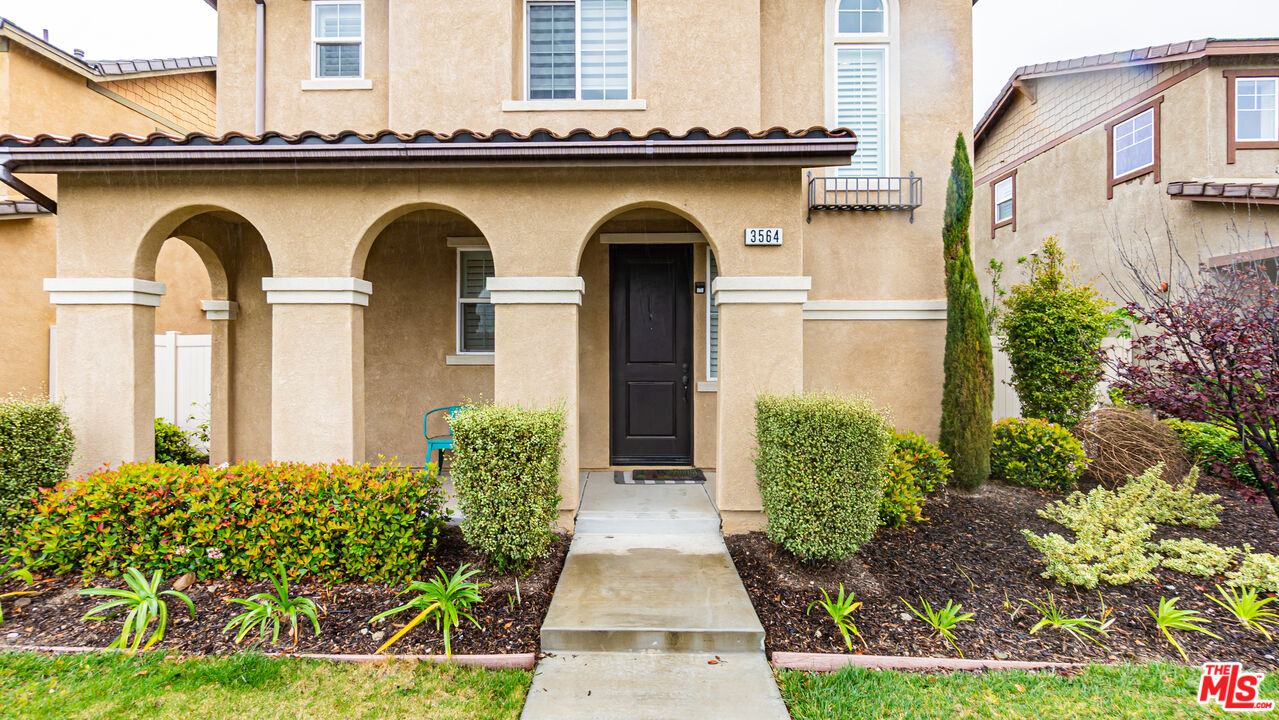 3564 Albion Drive Oxnard, CA 93036 - Photo 4 of 41 a front view of a house with garden