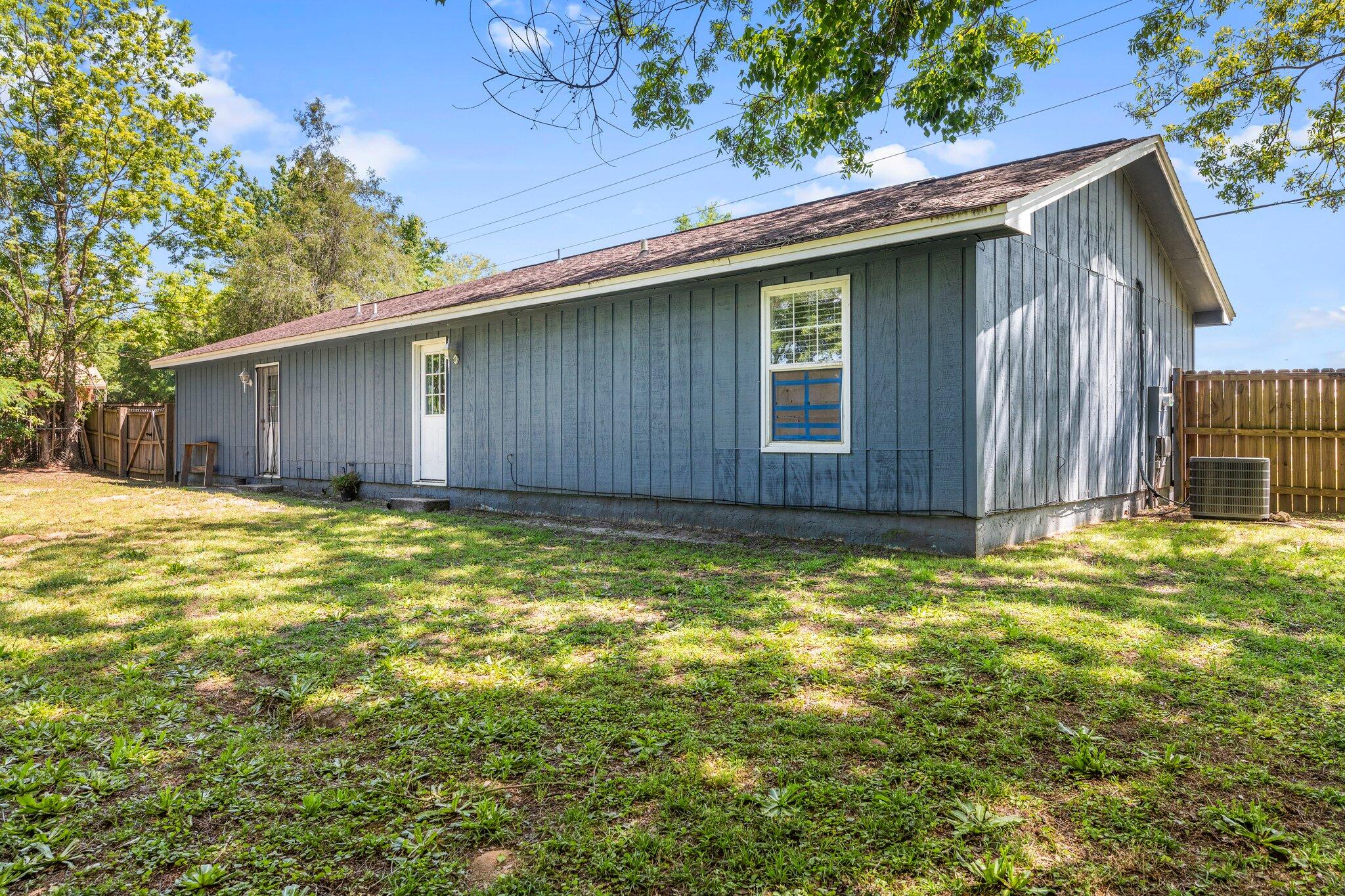 6066 Old Bethel Road Crestview, FL 32536 - Photo 23 of 25 a view of a house with a backyard
