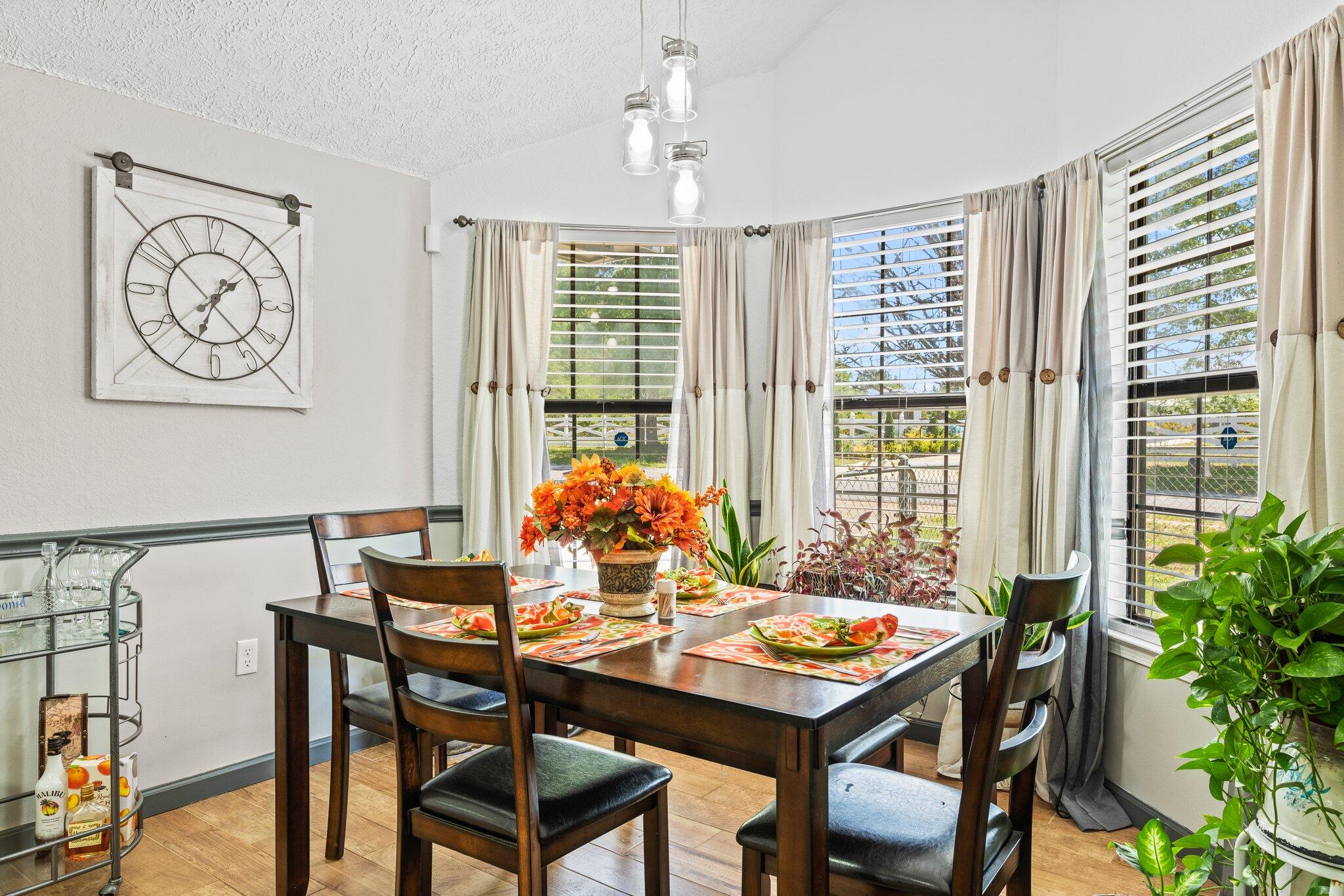 6066 Old Bethel Road Crestview, FL 32536 - Photo 8 of 25 a view of a dining room with furniture window and outside view