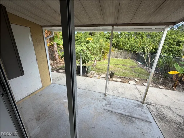a view of a porch with backyard