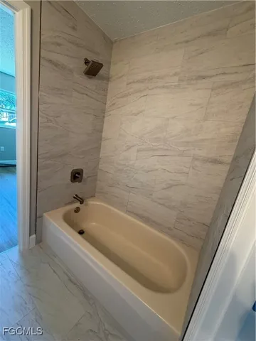 a bathroom with a tub