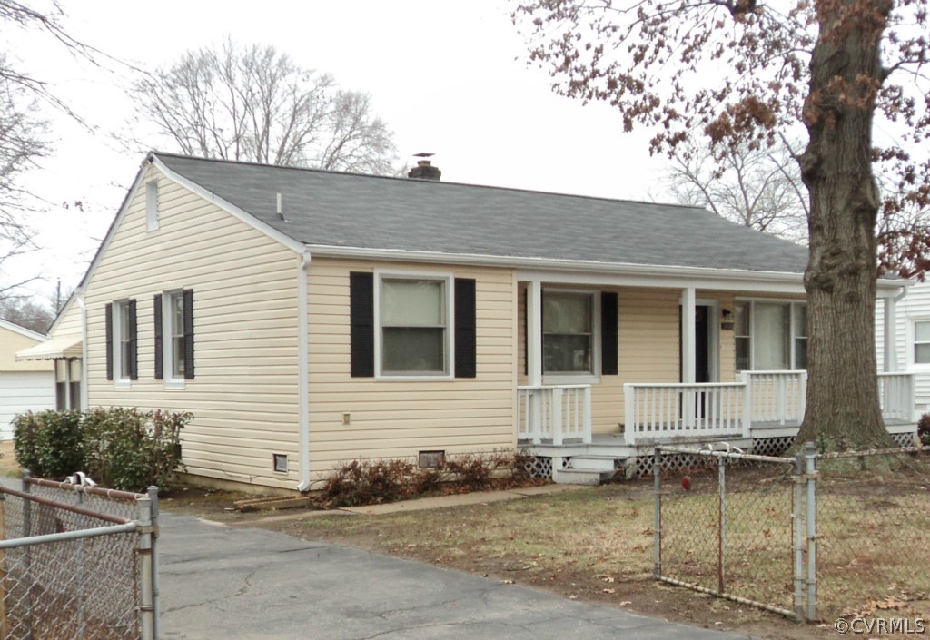 a front view of a house with patio