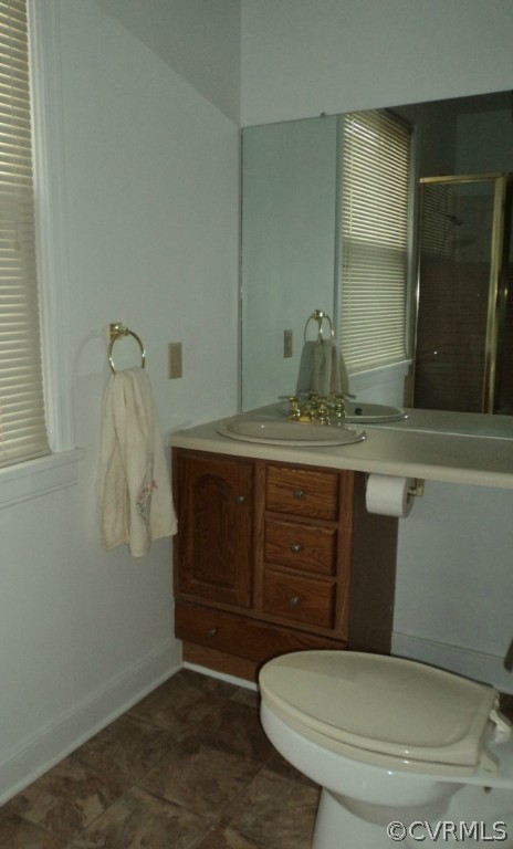 3030 Sherbourne Road Richmond, VA 23237 - Photo 12 of 20 a bathroom with a toilet and a sink