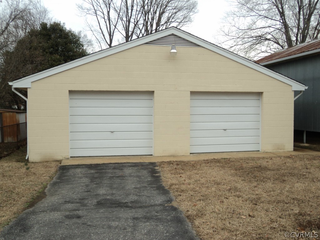 3030 Sherbourne Road Richmond, VA 23237 - Photo 17 of 20 a small white house with a outdoor space