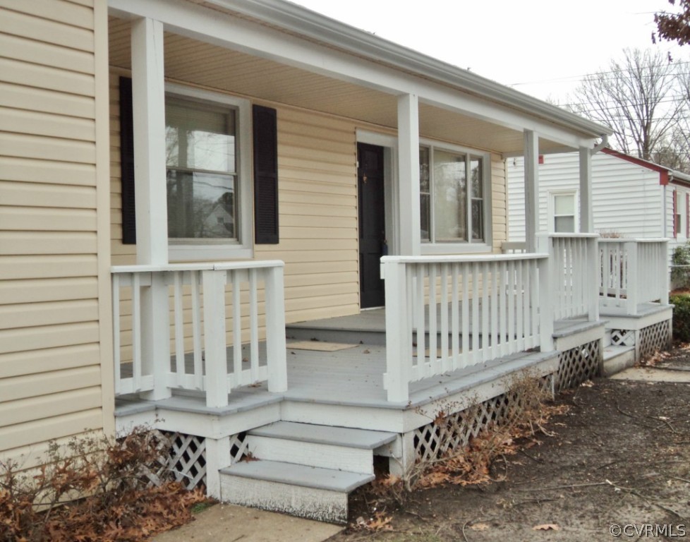 3030 Sherbourne Road Richmond, VA 23237 - Photo 18 of 20 a view of a house with a small yard