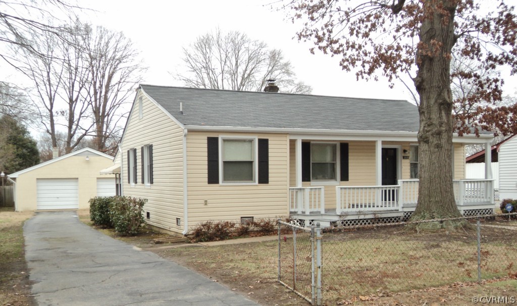 3030 Sherbourne Road Richmond, VA 23237 - Photo 19 of 20 a front view of a house with garage