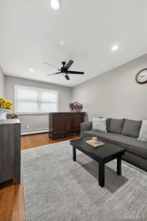 a living room with furniture and a table
