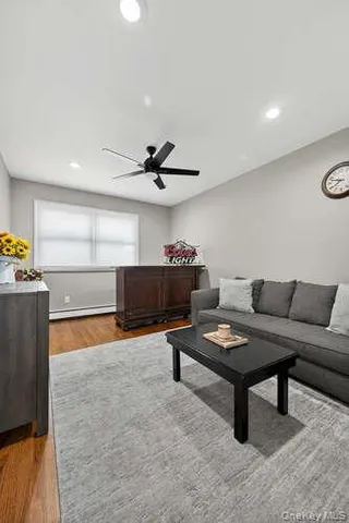 a living room with furniture and a table