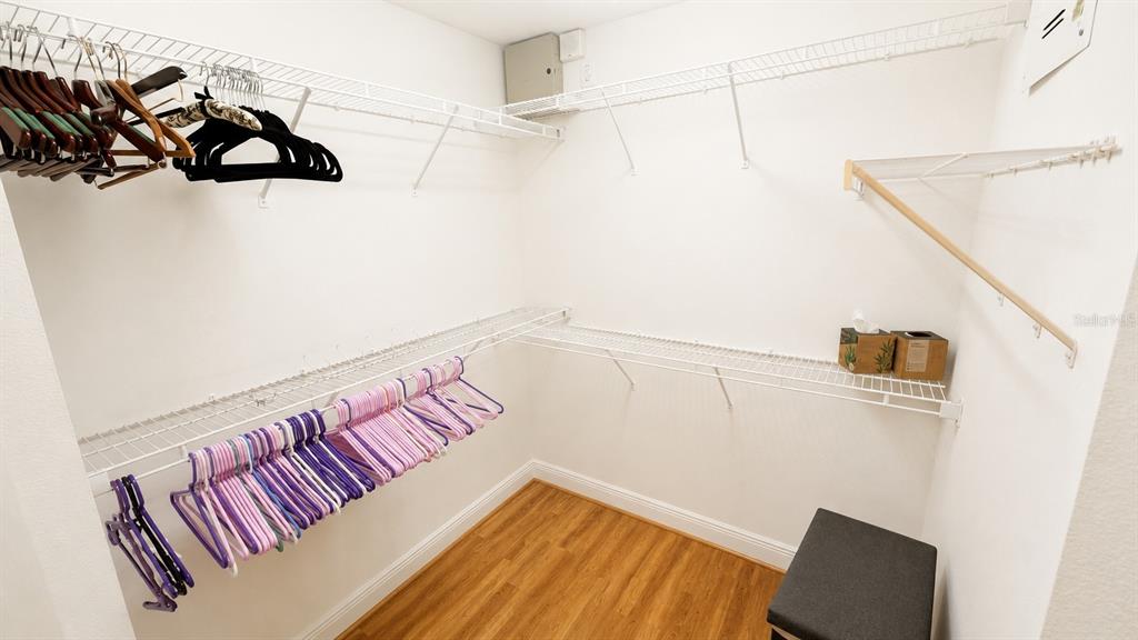 6552 Moorings Point Circle, Unit 102 Lakewood Ranch, FL 34202 - Photo 24 of 57 a view of a room with racks on the wall