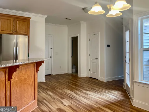 a view of entryway with wooden floor
