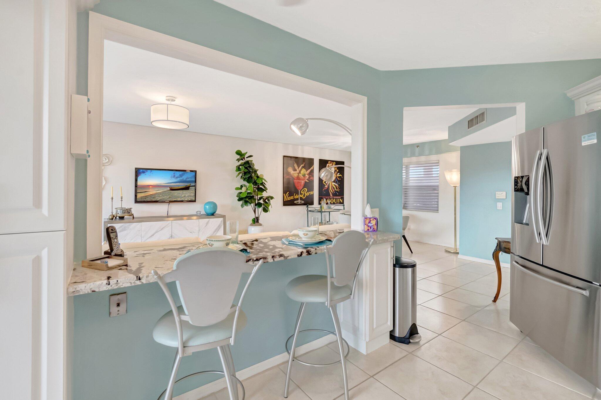 7507 La Paz Boulevard, Unit 202 Boca Raton, FL 33433 - Photo 11 of 31 kitchen