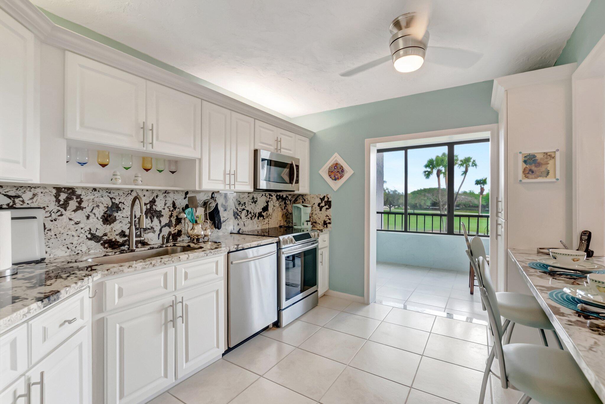7507 La Paz Boulevard, Unit 202 Boca Raton, FL 33433 - Photo 12 of 31 kitchen