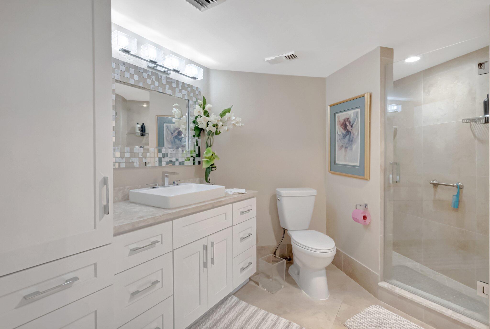 7507 La Paz Boulevard, Unit 202 Boca Raton, FL 33433 - Photo 19 of 31 master bathroom
