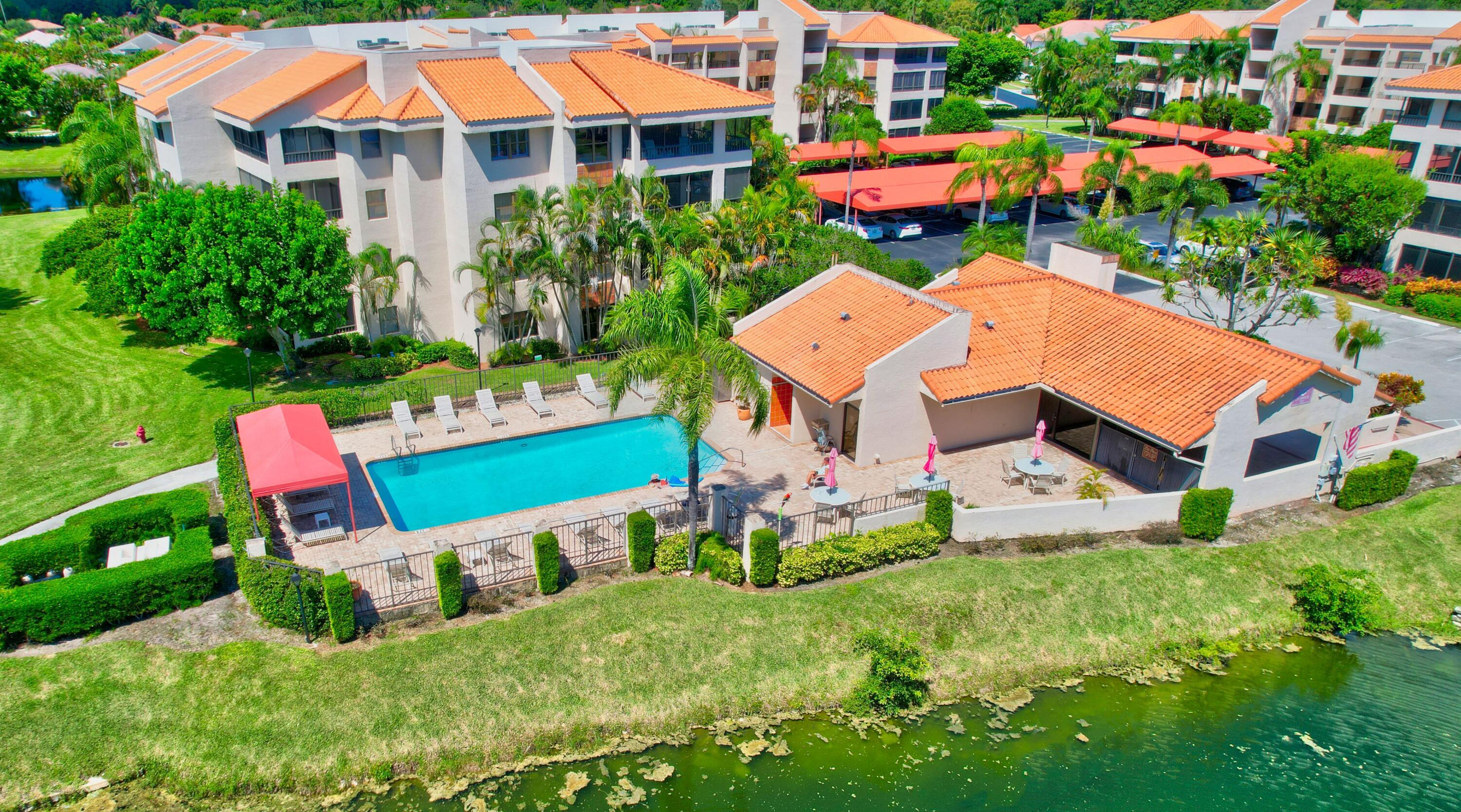 7507 La Paz Boulevard, Unit 202 Boca Raton, FL 33433 - Photo 29 of 31 La Paz pool