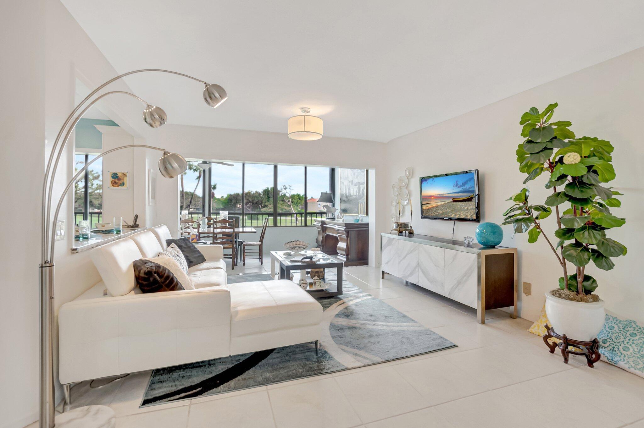 7507 La Paz Boulevard, Unit 202 Boca Raton, FL 33433 - Photo 4 of 31 living room