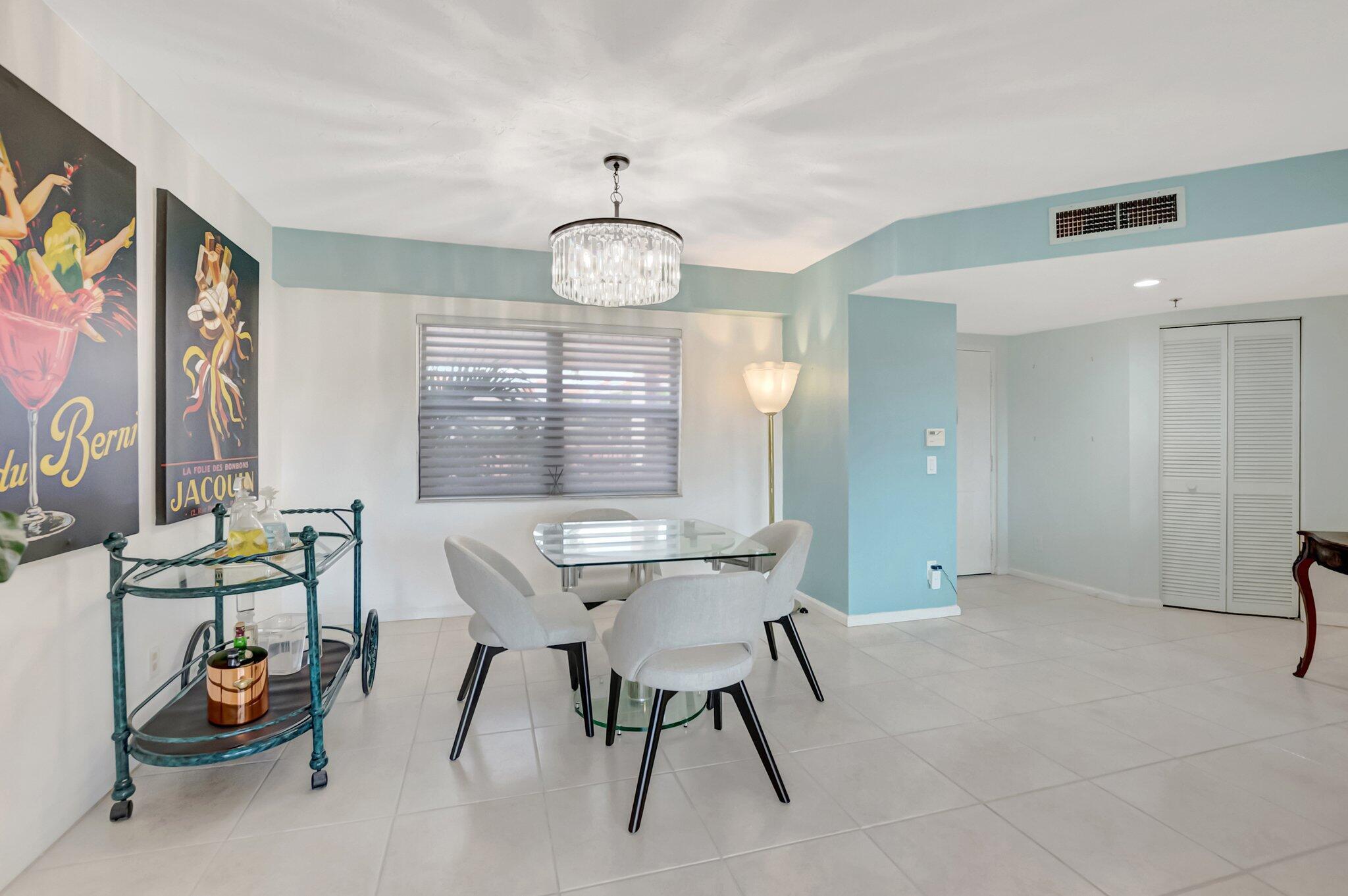 7507 La Paz Boulevard, Unit 202 Boca Raton, FL 33433 - Photo 9 of 31 dining room