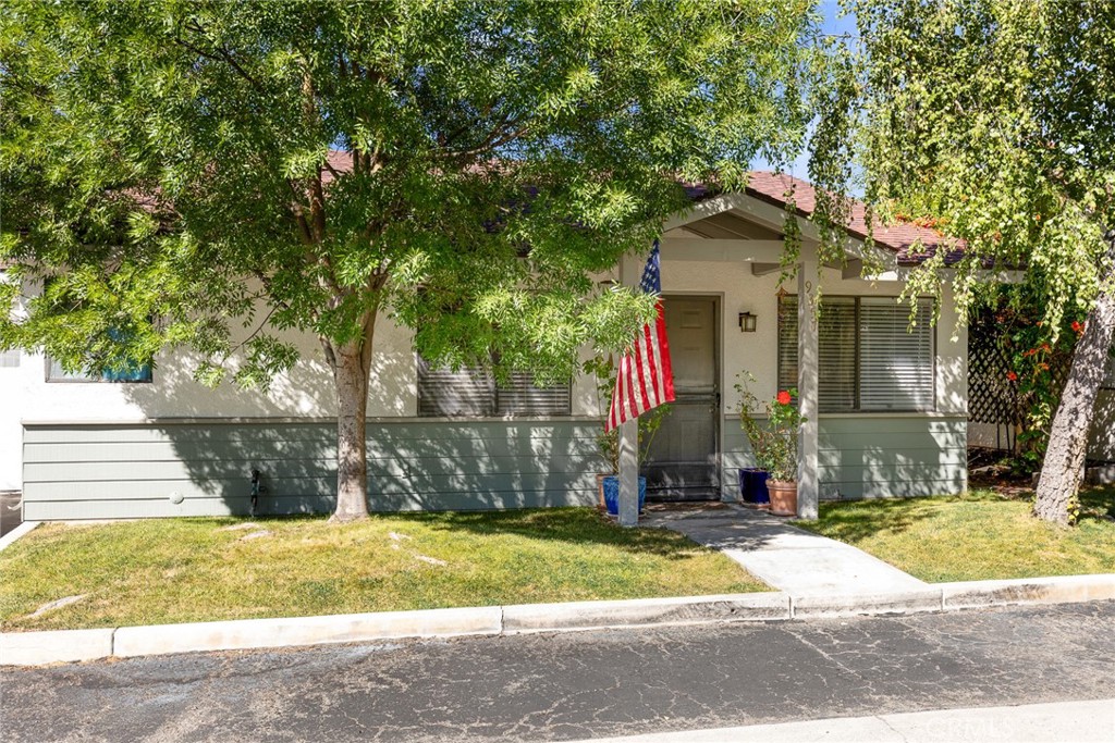 9357 Musselman Drive, Unit 9 Atascadero, CA 93422 - Photo 1 of 17 a front view of a house with a yard