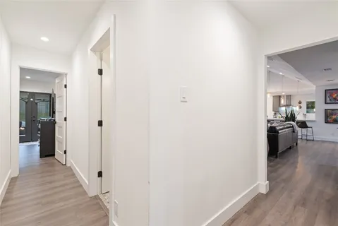 a view of a living room with a wooden floor