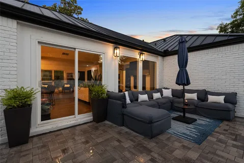 a building outdoor space with patio furniture