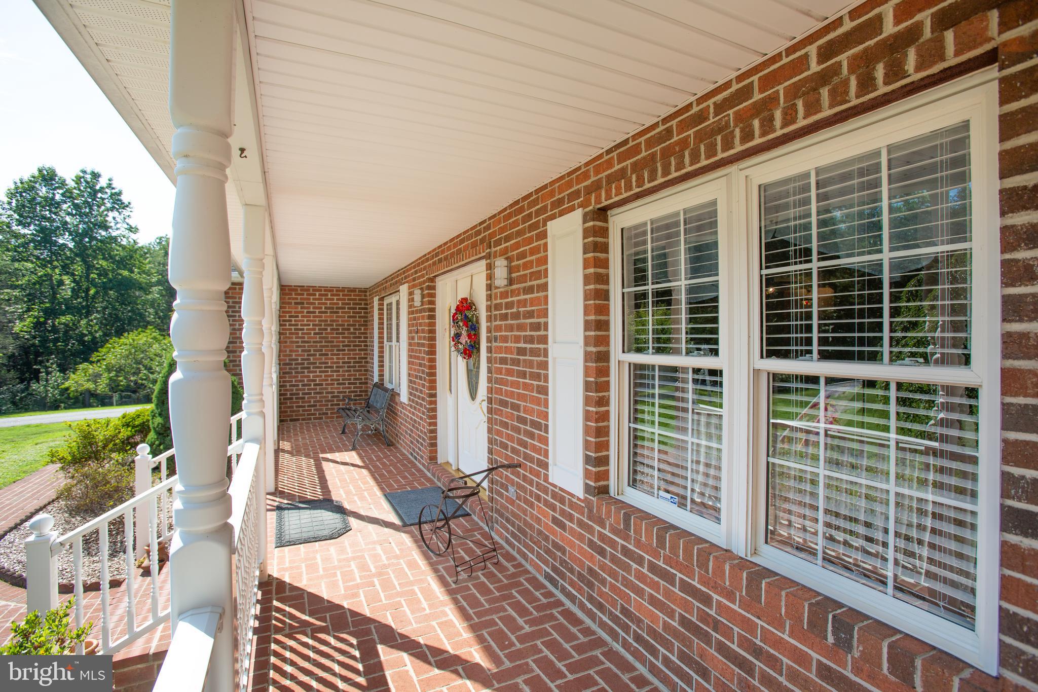 7376 Courthouse Road Spotsylvania, VA 22551 - Photo 7 of 54 Rocking-chair front porch