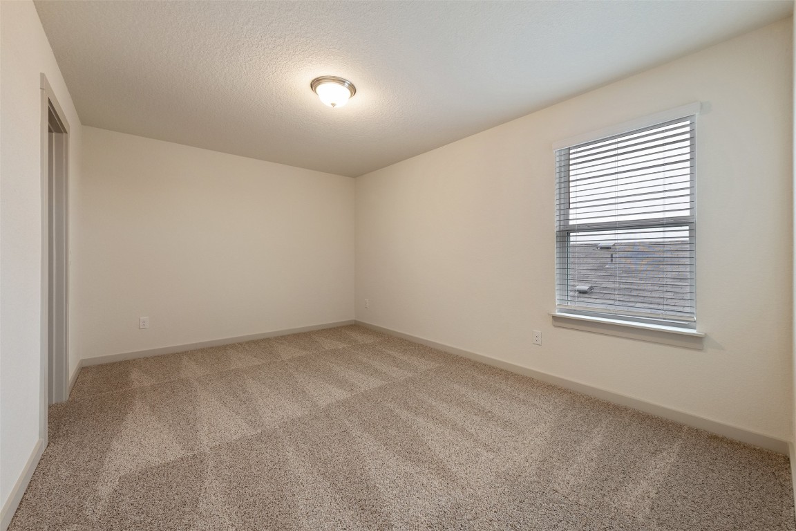 289 Deserti Road Leander, TX 78641 - Photo 15 of 19 an empty room with a window
