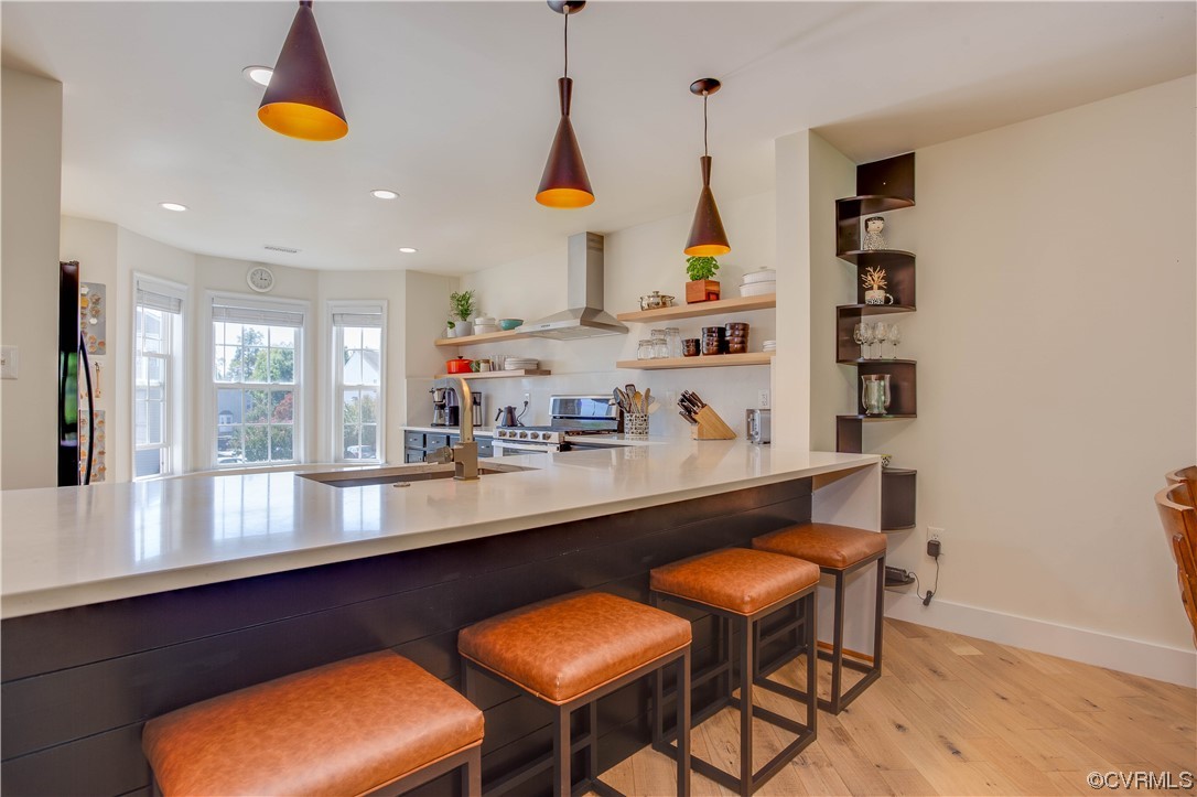 13312 Ridgemoor Lane Midlothian, VA 23114 - Photo 16 of 38 pendent lights accent the open serving bar and sho