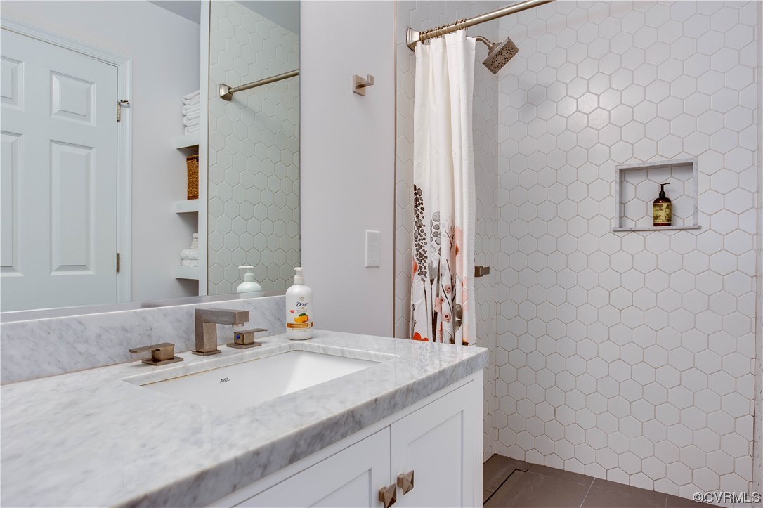 13312 Ridgemoor Lane Midlothian, VA 23114 - Photo 27 of 38 Bathroom tile floors and walk-in shower with showe