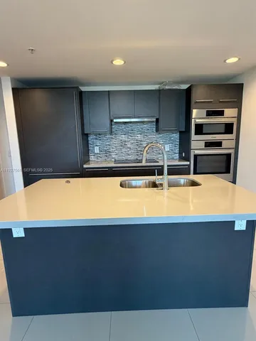 a swimming pool with outdoor seating