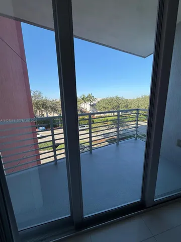 a view of a balcony with an outdoor space