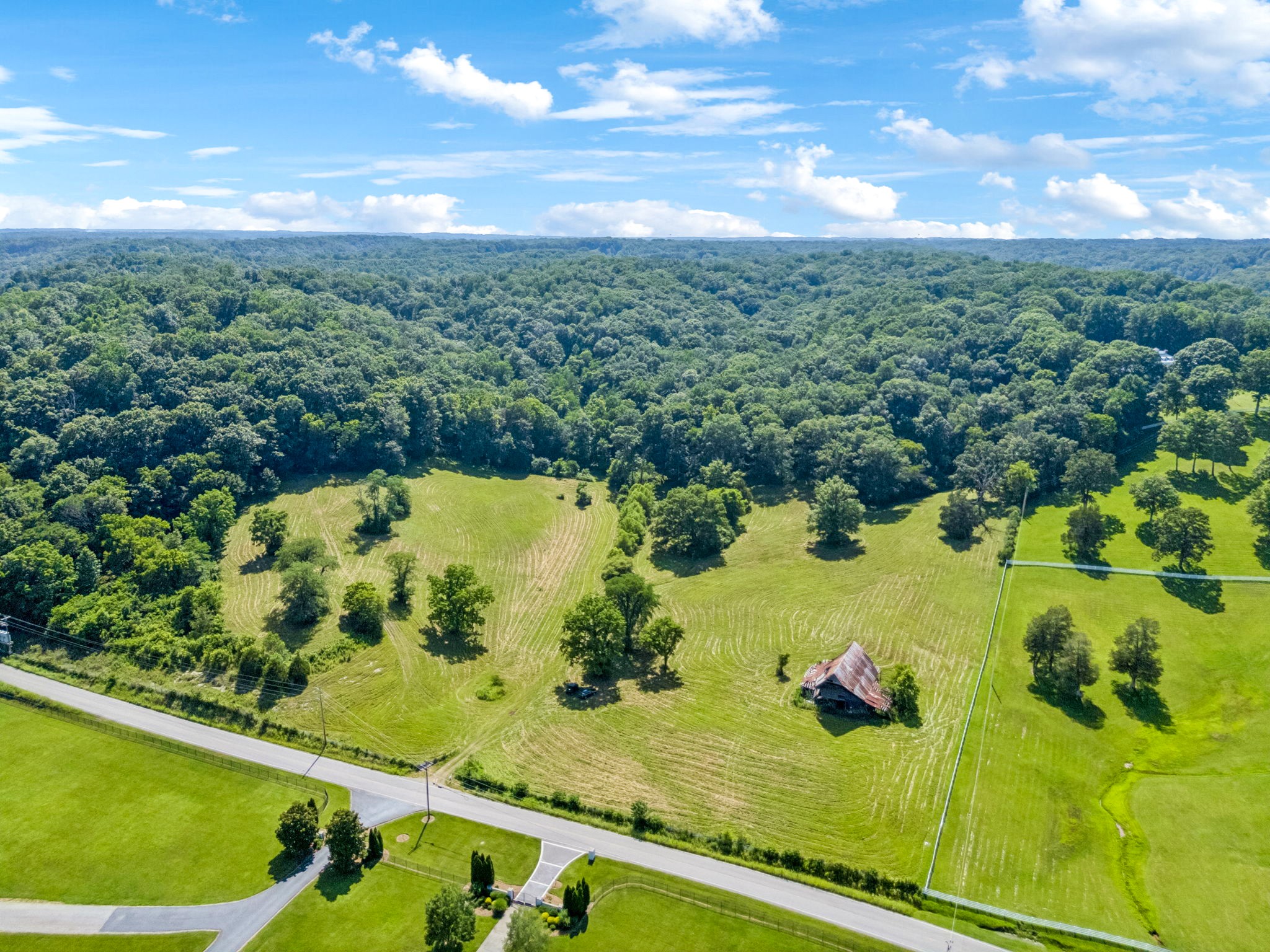5185 Old Harding Road Fairview, TN 37062 - Photo 11 of 38 a view of a lake from a yard