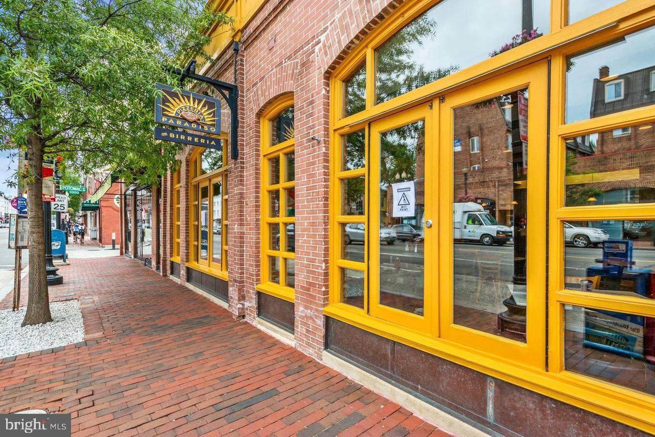 2320 Wisconsin Avenue Northwest, Unit 206 Washington, DC 20007 - Photo 27 of 32 a view of a building with a glass door