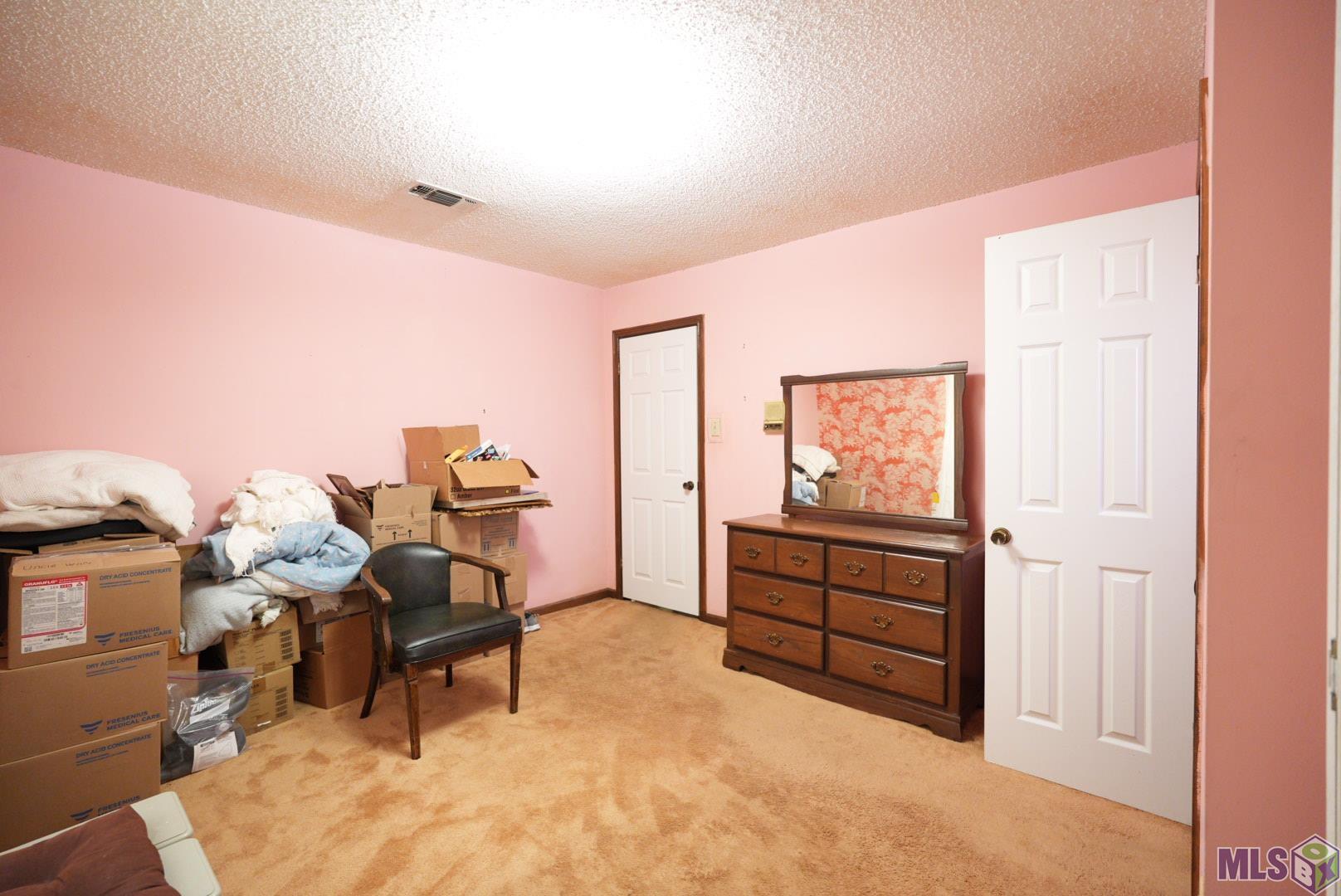 21321 Samuels Road Zachary, LA 70791 - Photo 29 of 48 Downstairs Bedroom #2