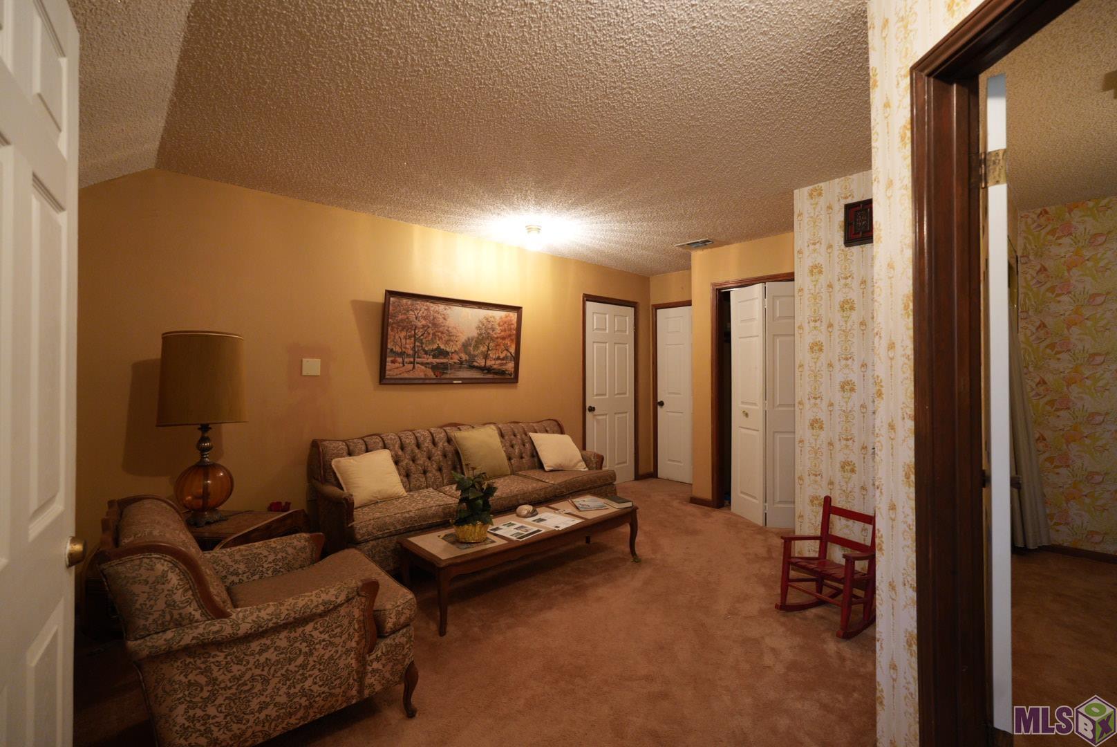 21321 Samuels Road Zachary, LA 70791 - Photo 36 of 48 Upstairs Sitting Room