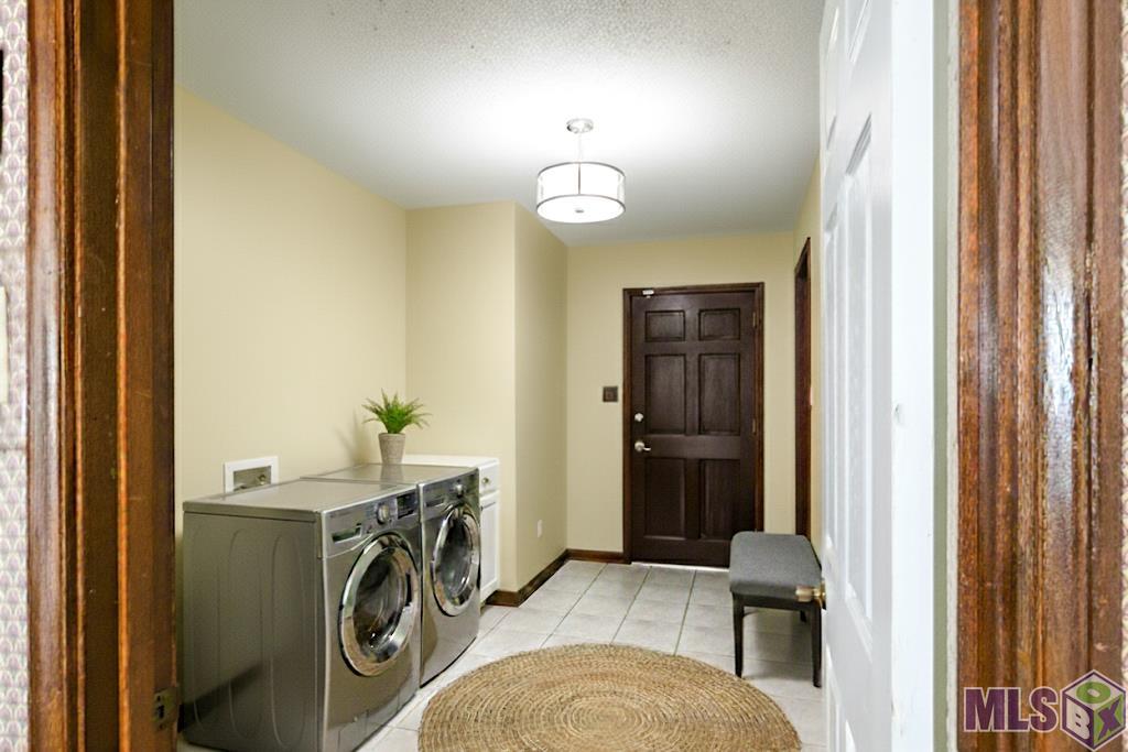 21321 Samuels Road Zachary, LA 70791 - Photo 42 of 48 Virtually Stage Laundry Room
