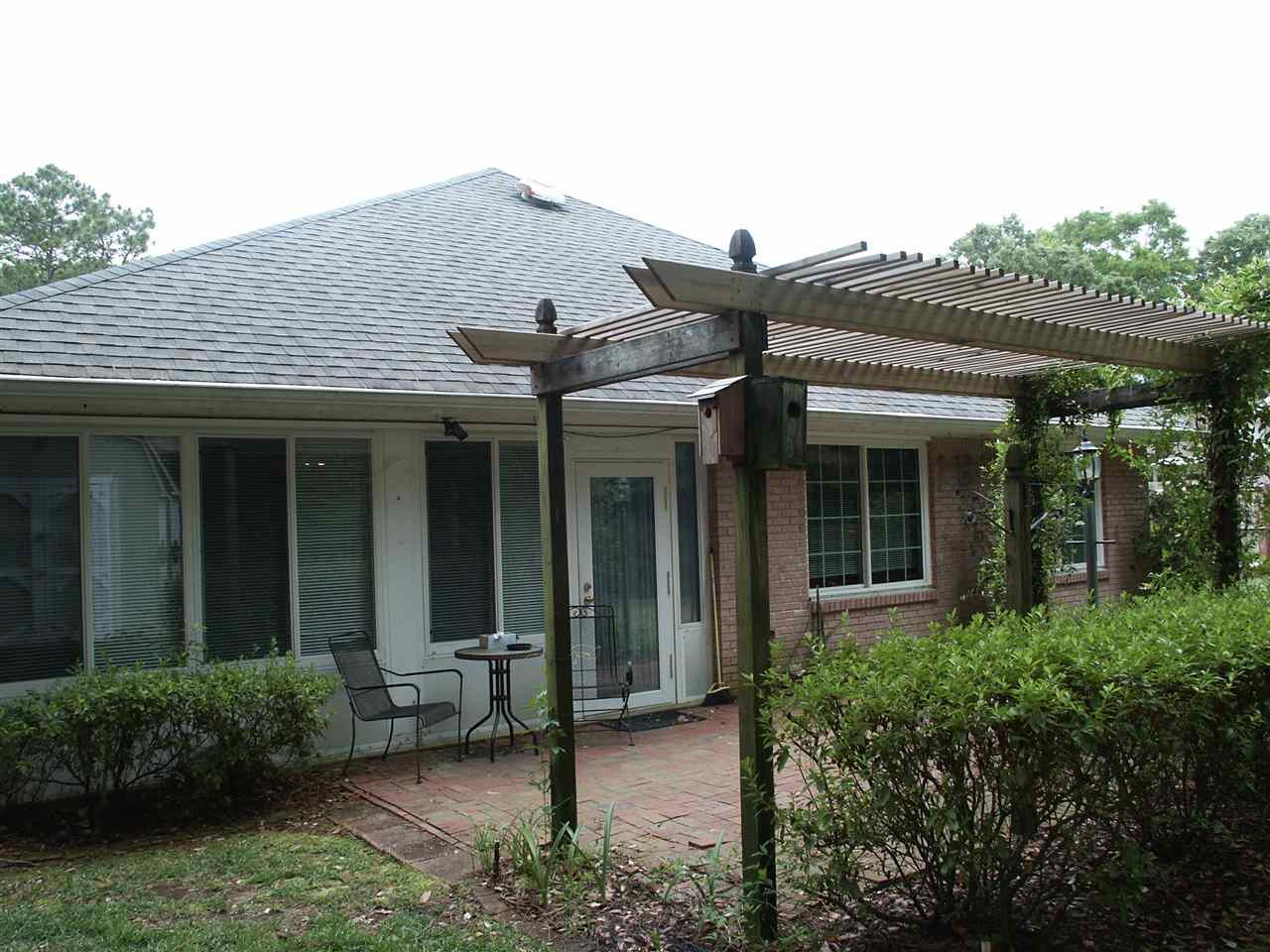 2807 Pine Ridge Drive Lillian, AL 36549 - Photo 22 of 29 Back of Home With Arbor