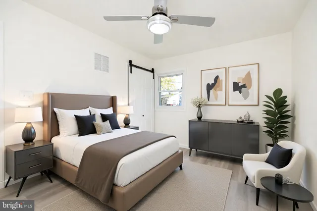 a bedroom with a bed and furniture