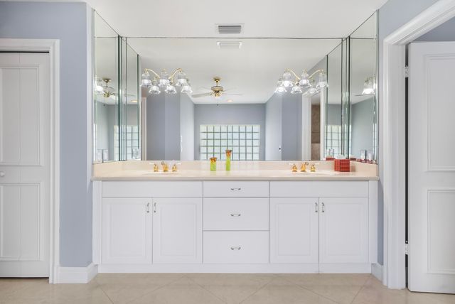 a dining room with furniture and a window