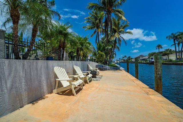 an aerial view of residential building and lake