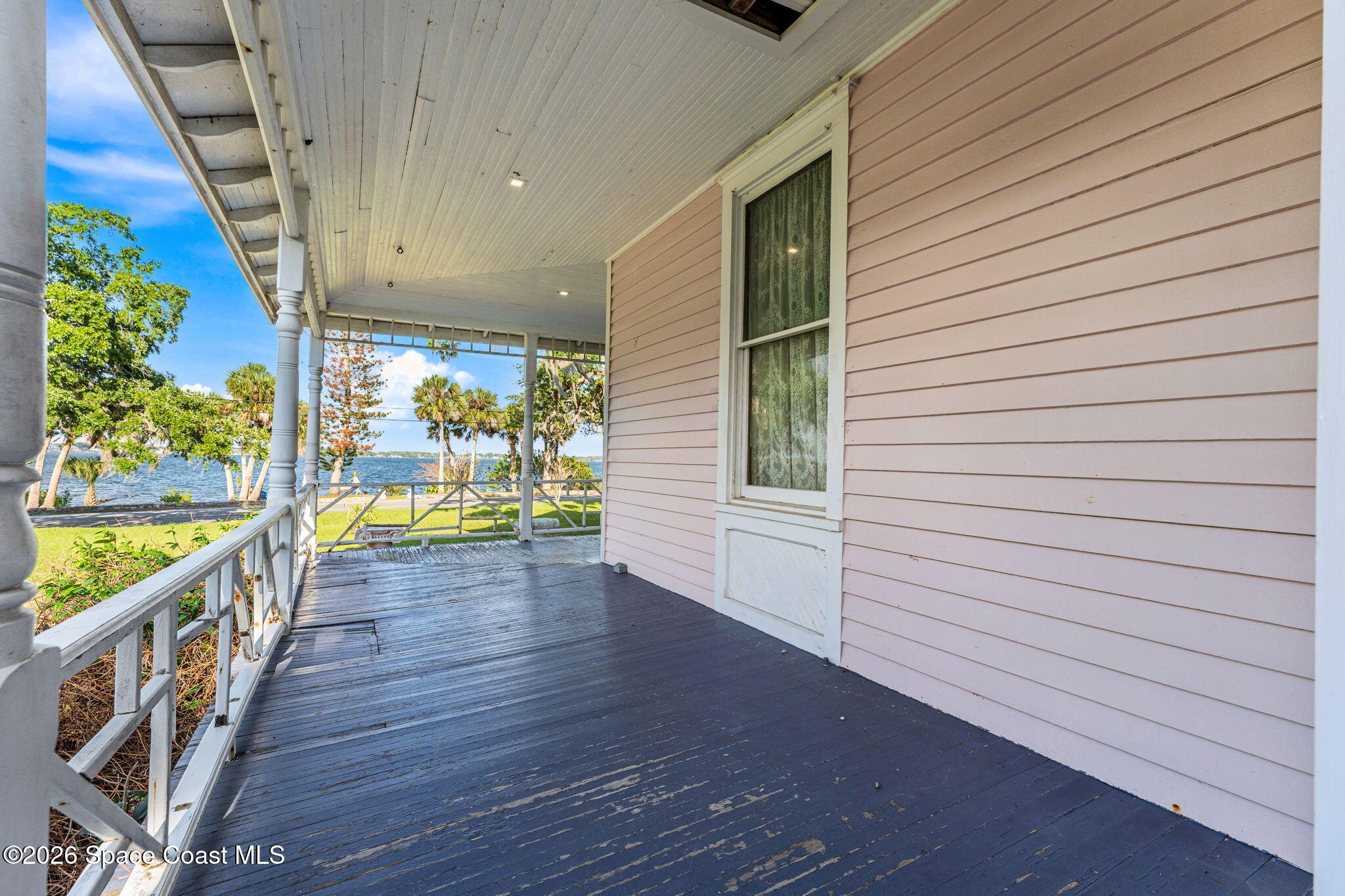 1101 Rockledge Drive Rockledge, FL 32955 - Photo 70 of 76 a view of a hallway with wooden floor