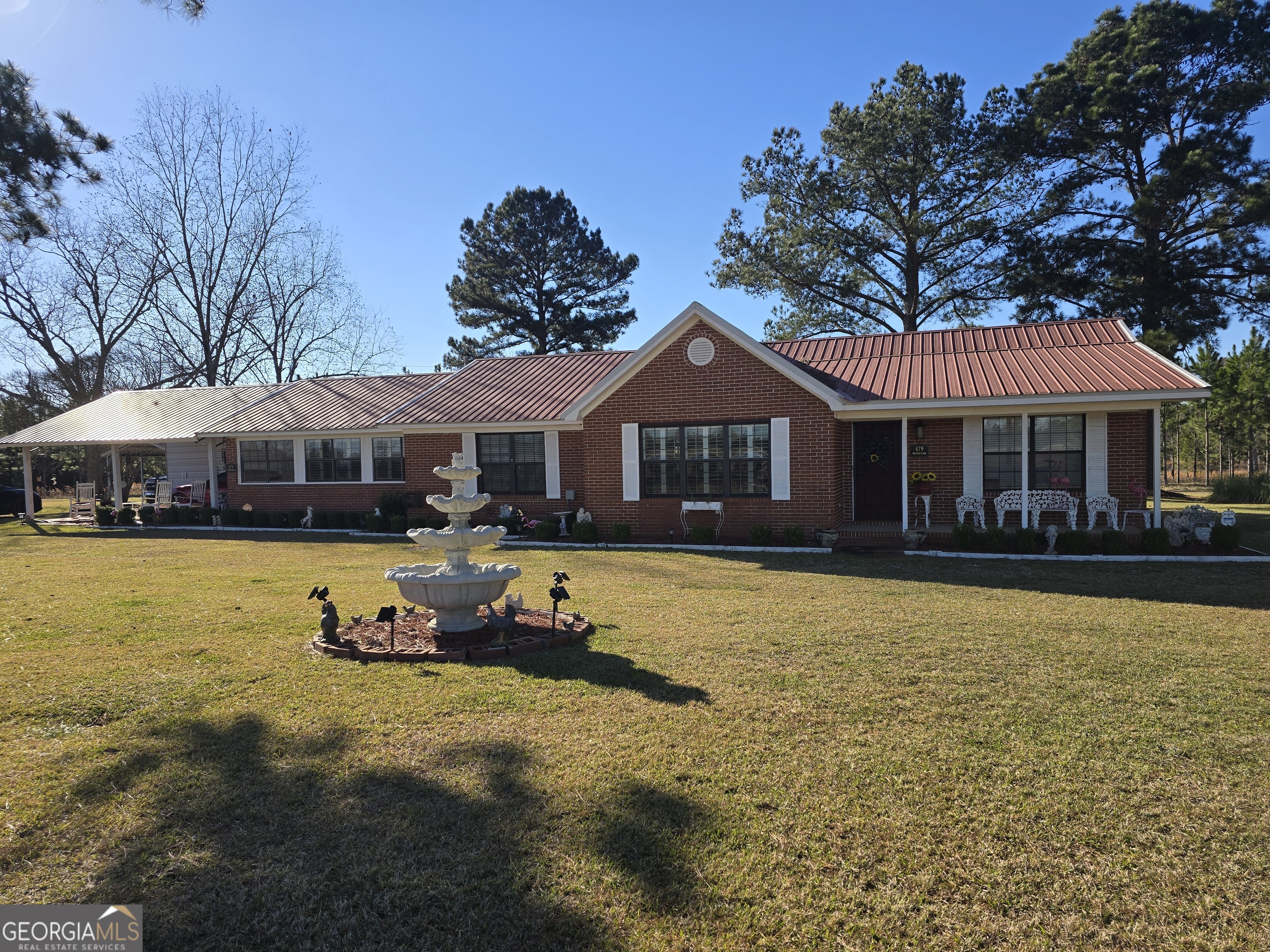 479 Mitchell Loop Bluffton, GA 39824 - Photo 51 of 51 a front view of a house with swimming pool