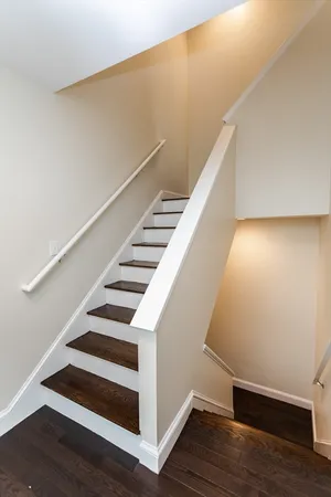 a view of entryway with wooden floor